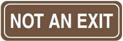 NMC - Not an Exit, 11" Wide, Acrylic Sign - English, Brown on White, Wall Mount - Benchmark Tooling