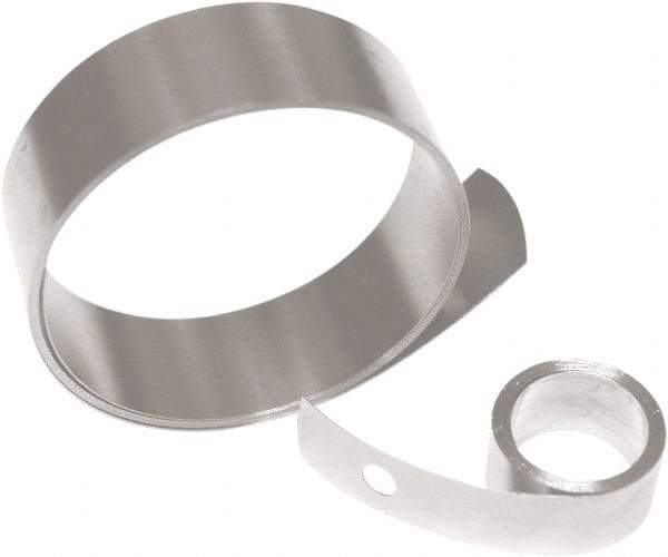 Associated Spring Raymond - 0.004" Thick x 15" Long, 2.94 N Capacity Constant Force Spring - 1/4" Wide, 0.25" ID of Reflection, 0.61" Initial Extension, 0.13" End Hole Diam - Benchmark Tooling