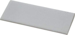 Norton - 4" Long x 1-3/4" Diam x 3/8" Thick, Novaculite Sharpening Stone - Round, Ultra Fine Grade - Benchmark Tooling