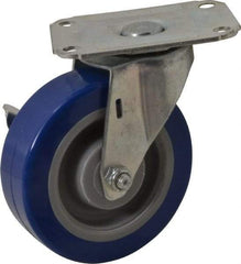 E.R. Wagner - 4" Diam x 1-1/4" Wide x 4-11/16" OAH Top Plate Mount Swivel Caster with Brake - Polyurethane, 275 Lb Capacity, Delrin Bearing, 2-3/4 x 3-3/4" Plate - Benchmark Tooling
