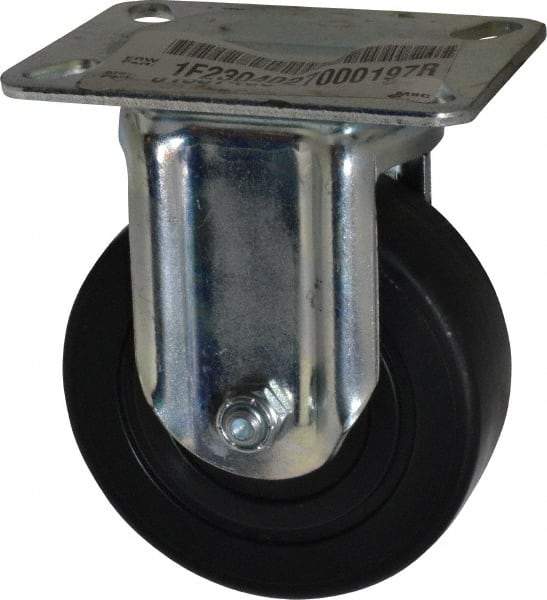 E.R. Wagner - 4" Diam x 1-3/8" Wide x 5-1/16" OAH Top Plate Mount Rigid Caster - Polyolefin, 300 Lb Capacity, Plain Bearing, 3-1/8 x 4-1/8" Plate - Benchmark Tooling