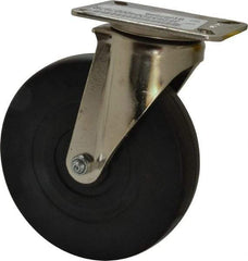 E.R. Wagner - 6" Diam x 1-3/8" Wide x 7-3/8" OAH Top Plate Mount Swivel Caster - Soft Rubber, 280 Lb Capacity, Delrin Bearing, 3-1/8 x 4-1/8" Plate - Benchmark Tooling