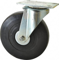 E.R. Wagner - 6" Diam x 1-3/8" Wide x 7-1/16" OAH Top Plate Mount Swivel Caster - Soft Rubber, 280 Lb Capacity, Delrin Bearing, 3-1/8 x 4-1/8" Plate - Benchmark Tooling