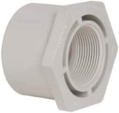 Value Collection - 2-1/2 x 1-1/2" PVC Plastic Pipe Bushing - Schedule 40, Spig x FIPT End Connections - Benchmark Tooling