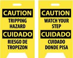 NMC - Caution - Tripping Hazard, Caution - Watch Your Step, 12" Wide x 19" High, Plastic Floor Sign - English/Spanish, A-Frame, Black on Yellow, For Accident Prevention - Benchmark Tooling