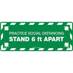 Adhesive Backed Floor Signs; Message Type: COVID-19; Graphic Type: None; Message or Graphic: Message & Graphic; Legend: Practice Social Distancing Stand 6Ft Apart; Color: White; Green; Special Color Properties: No Special Properties; Material: Vinyl; Shap