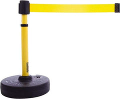 Banner Stakes - 22 to 42" High, 2-3/8" Pole Diam, Barrier Post Base & Stanchion - 9" Base Diam, Round Nylon Base, Yellow Plastic Post, 15' x 2-1/2" Tape, For Outdoor Use - Benchmark Tooling