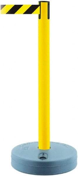 Tensator - 38" High, 2-1/2" Pole Diam, Barricade Tape Dispenser - 14" Base Diam, Round Plastic Base, Yellow Polymer Post, 7-1/2' x 1-7/8" Tape, Single Line Tape, For Outdoor Use - Benchmark Tooling