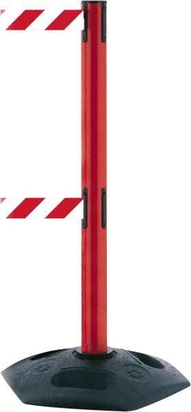 Tensator - 38" High, 2-1/2" Pole Diam, 4 Way Stanchion - 19" Base Diam, Octagon Recycled Rubber Base, Red Plastic Post, 7-1/2' x 2" Tape, Dual Line Tape, For Outdoor Use - Benchmark Tooling
