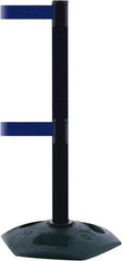 Tensator - 38" High, 2-1/2" Pole Diam, 4 Way Stanchion - 19" Base Diam, Octagon Recycled Rubber Base, Black Plastic Post, 7-1/2' x 2" Tape, Dual Line Tape, For Outdoor Use - Benchmark Tooling