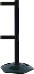 Tensator - 38" High, 2-1/2" Pole Diam, 4 Way Stanchion - 19" Base Diam, Octagon Recycled Rubber Base, Black Plastic Post, 7-1/2' x 2" Tape, Dual Line Tape, For Outdoor Use - Benchmark Tooling