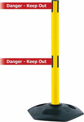 Tensator - 38" High, 2-1/2" Pole Diam, 4 Way Stanchion - 19" Base Diam, Octagon Recycled Rubber Base, Yellow Plastic Post, 7-1/2' x 2" Tape, Dual Line Tape, For Outdoor Use - Benchmark Tooling