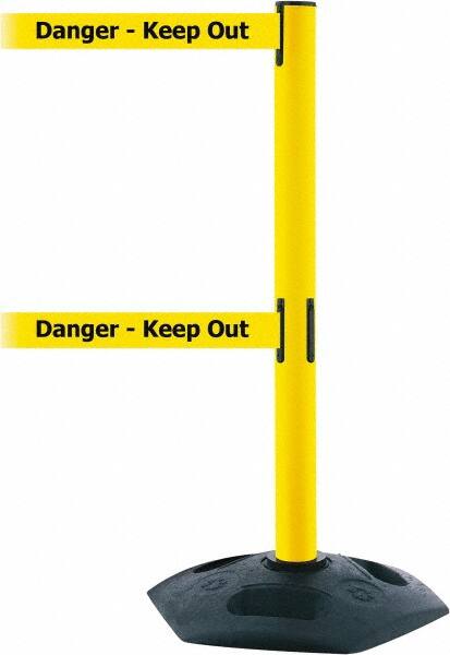 Tensator - 38" High, 2-1/2" Pole Diam, 4 Way Stanchion - 19" Base Diam, Octagon Recycled Rubber Base, Yellow Plastic Post, 7-1/2' x 2" Tape, Dual Line Tape, For Outdoor Use - Benchmark Tooling