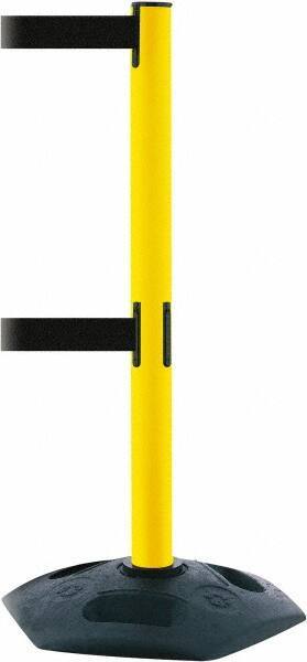 Tensator - 38" High, 2-1/2" Pole Diam, 4 Way Stanchion - 19" Base Diam, Octagon Recycled Rubber Base, Yellow Plastic Post, 7-1/2' x 2" Tape, Dual Line Tape, For Outdoor Use - Benchmark Tooling