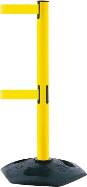 Tensator - 38" High, 2-1/2" Pole Diam, 4 Way Stanchion - 19" Base Diam, Octagon Recycled Rubber Base, Yellow Plastic Post, 13' x 2" Tape, Dual Line Tape, For Outdoor Use - Benchmark Tooling