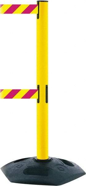 Tensator - 38" High, 2-1/2" Pole Diam, 4 Way Stanchion - 19" Base Diam, Octagon Recycled Rubber Base, Yellow Plastic Post, 13' x 2" Tape, Dual Line Tape, For Outdoor Use - Benchmark Tooling