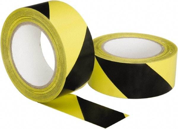 Ability One - Black & Yellow Striped Vinyl Tape - 2" Wide x 108' Long, General Traffic - Benchmark Tooling