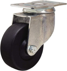 Hamilton - 3-1/2" Diam x 1-1/4" Wide x 4-13/16" OAH Top Plate Mount Swivel Caster - Hard Rubber, 140 Lb Capacity, Self-Lubricating Bearing, 2-1/2 x 3-3/4" Plate - Benchmark Tooling