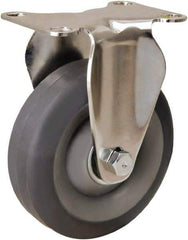 Hamilton - 4" Diam x 1-3/8" Wide x 5-1/8" OAH Top Plate Mount Rigid Caster - Rubber Mold on Polyolefin, 250 Lb Capacity, Delrin Bearing, 2-3/8 x 3-5/8" Plate - Benchmark Tooling