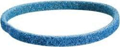Norton - 4" Wide x 132" OAL, 150 Grit, Aluminum Oxide Abrasive Belt - Aluminum Oxide, Very Fine, Nonwoven, Wet/Dry - Benchmark Tooling