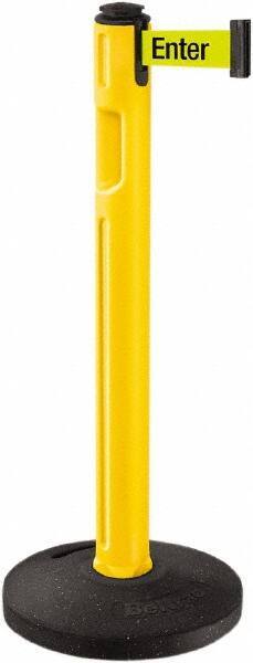 Lavi Industries - 38-1/4" High, 3-1/4" Pole Diam, Stanchion - 16" Base Diam, Dome Recycled Rubber Base, Yellow Plastic Post, 12' x 2" Tape, Single Line Tape, For Outdoor Use - Benchmark Tooling