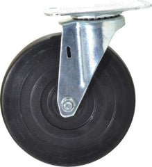 E.R. Wagner - 5" Diam x 1" Wide x 5-13/16" OAH Top Plate Mount Swivel Caster - Hard Rubber, 145 Lb Capacity, Delrin Bearing, 2-3/4 x 3-3/4" Plate - Benchmark Tooling