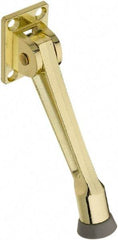 National Mfg. - 5" Projection Kickdown Door Stop - Screw Mount, Brass Finish - Benchmark Tooling