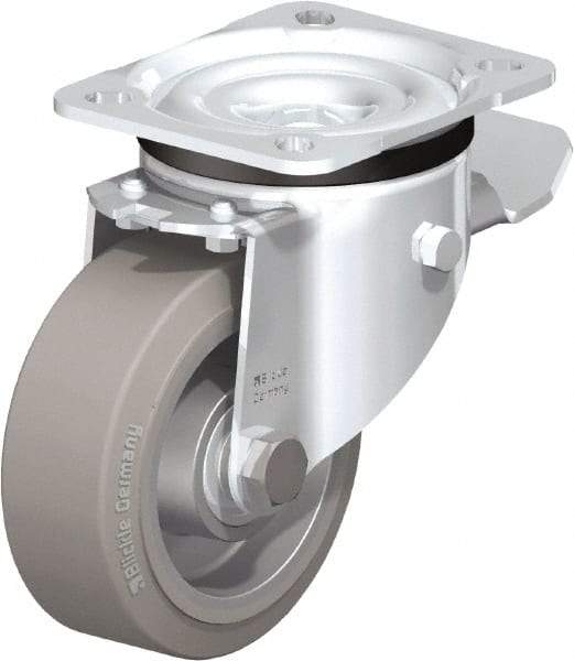 Blickle - 4" Diam x 1-37/64" Wide x 5-7/64" OAH Top Plate Mount Swivel Caster with Brake - Solid Rubber, 440 Lb Capacity, Ball Bearing, 3-15/16 x 3-3/8" Plate - Benchmark Tooling