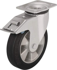 Blickle - 5" Diam x 1-31/32" Wide x 6-11/16" OAH Top Plate Mount Swivel Caster with Brake - Solid Rubber, 594 Lb Capacity, Ball Bearing, 5-1/2 x 4-3/8" Plate - Benchmark Tooling