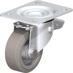 Blickle - 4" Diam x 1-37/64" Wide x 5-7/64" OAH Top Plate Mount Swivel Caster with Brake - Solid Rubber, 440 Lb Capacity, Ball Bearing, 5-1/2 x 4-3/8" Plate - Benchmark Tooling