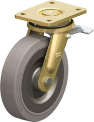 Blickle - 8" Diam x 1-31/32" Wide x 9-41/64" OAH Top Plate Mount Swivel Caster with Brake - Solid Rubber, 1,320 Lb Capacity, Ball Bearing, 5-1/2 x 4-3/8" Plate - Benchmark Tooling