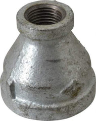 B&K Mueller - Class 150, 1-1/4 x 1/2" Galvanized Pipe Reducing Coupling - Threaded, Malleable Iron - Benchmark Tooling