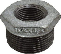 B&K Mueller - Class 150, 1-1/4 x 3/4" Galvanized Pipe Hex Bushing - Threaded, Malleable Iron - Benchmark Tooling