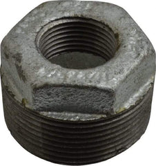 B&K Mueller - Class 150, 1-1/2 x 3/4" Galvanized Pipe Hex Bushing - Threaded, Malleable Iron - Benchmark Tooling