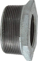 B&K Mueller - Class 150, 2 x 1-1/4" Galvanized Pipe Hex Bushing - Threaded, Malleable Iron - Benchmark Tooling
