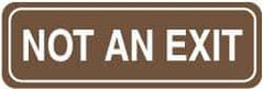 NMC - Not an Exit, 11" Wide, Acrylic Sign - English, Brown on White, Wall Mount - Benchmark Tooling