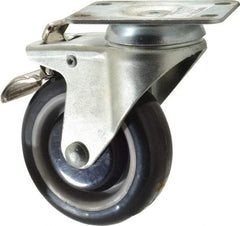 Value Collection - 4" Diam x 1-1/4" Wide x 5-13/32" OAH Top Plate Mount Swivel Caster with Brake - Polyurethane, 235 Lb Capacity, Ball Bearing, 2-7/8 x 3-5/8" Plate - Benchmark Tooling