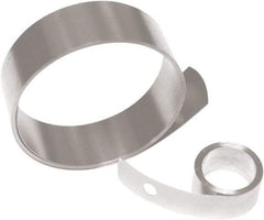 Associated Spring Raymond - 0.004" Thick x 15" Long, 2.94 N Capacity Constant Force Spring - 1/4" Wide, 0.25" ID of Reflection, 0.61" Initial Extension, 0.13" End Hole Diam - Benchmark Tooling