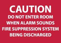 NMC - Caution - Do Not Enter Room When Alarm Sounds - Fire Suppression System Being Discharged, Plastic Fire Sign - 10" Wide x 7" High - Benchmark Tooling