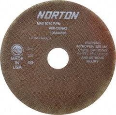 Norton - 7" 60 Grit Aluminum Oxide Cutoff Wheel - 0.035" Thick, 1-1/4" Arbor, 8,730 Max RPM, Use with Stationary Grinders - Benchmark Tooling