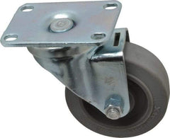 Albion - 3-1/2" Diam x 1-1/4" Wide x 4-1/4" OAH Top Plate Mount Swivel Caster - Rubber, 250 Lb Capacity, Ball Bearing, 2-1/2 x 3-5/8" Plate - Benchmark Tooling
