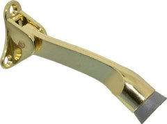 National Mfg. - 4" Projection Kickdown Door Stop - Door Mount, Brass Finish - Benchmark Tooling