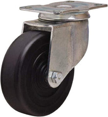 Hamilton - 4" Diam x 1-1/4" Wide x 5" OAH Top Plate Mount Swivel Caster - Hard Rubber, 165 Lb Capacity, Self-Lubricating Bearing, 2-1/2 x 3-3/4" Plate - Benchmark Tooling