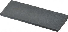 Norton - 4-1/2" Long x 1-3/4" Diam x 1/2" Thick, Silicon Carbide Sharpening Stone - Round, Medium Grade - Benchmark Tooling